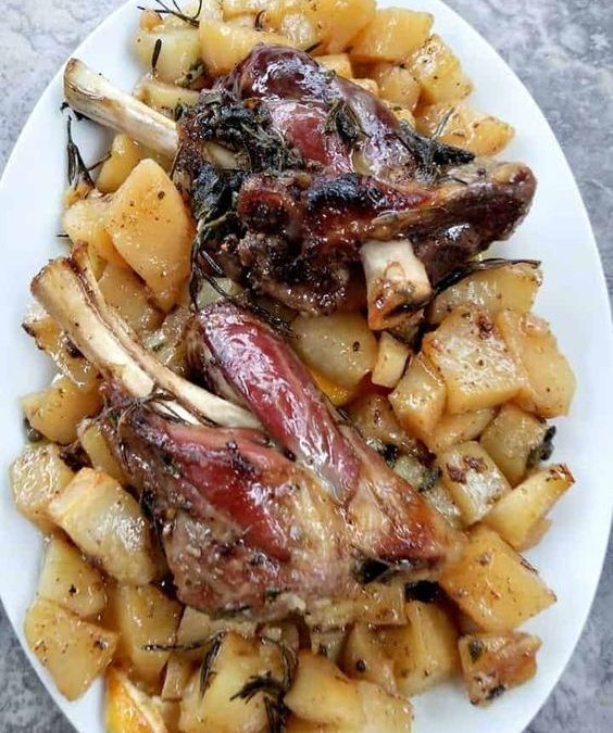 Cordero Asado al horno con patatas.